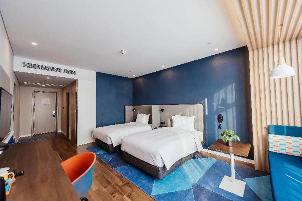Holiday Inn Taizhou Cmc Exterior foto